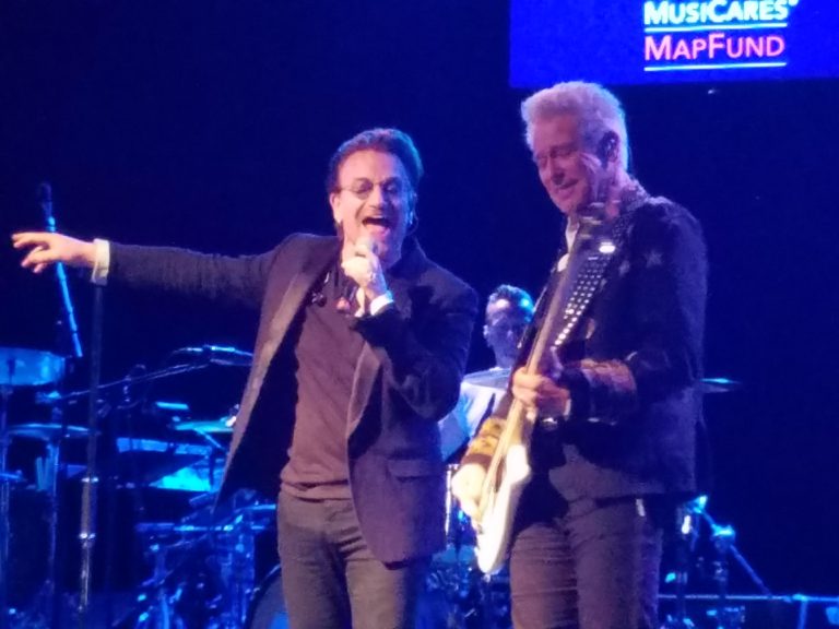 U2 Puts on a Mini Concert in Times Square for Charity, Bassist Adam Clayton Credits Clapton, Townsend For Helping Save Him