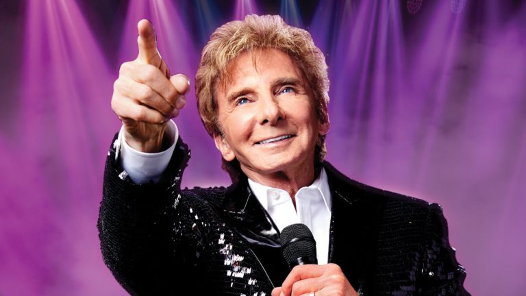 Barry Manilow Comes After Mariah Carey with a Surprise Version of Her “All I Want for Christmas” Perennial